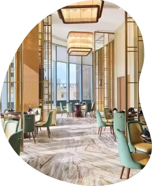 Luxury hotel dining area with elegant furniture, marble flooring, and contemporary interior design